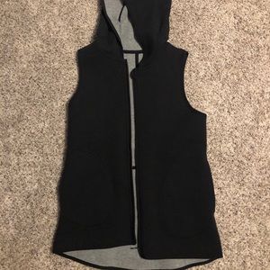 Reversible spacer vest with hood
